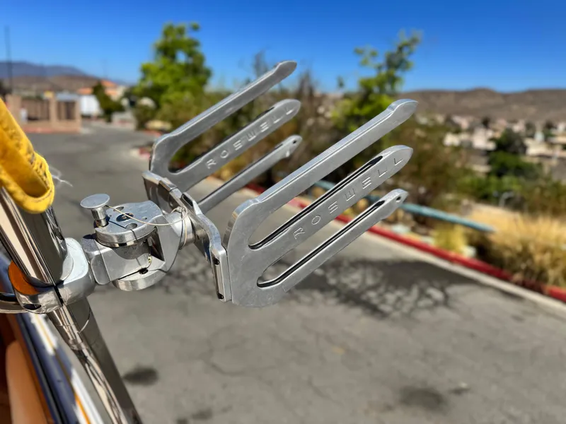 Slide: The Image of Close-up of a Roswell wakeboard rack on a 2006 Cobalt 246 boat. - 13