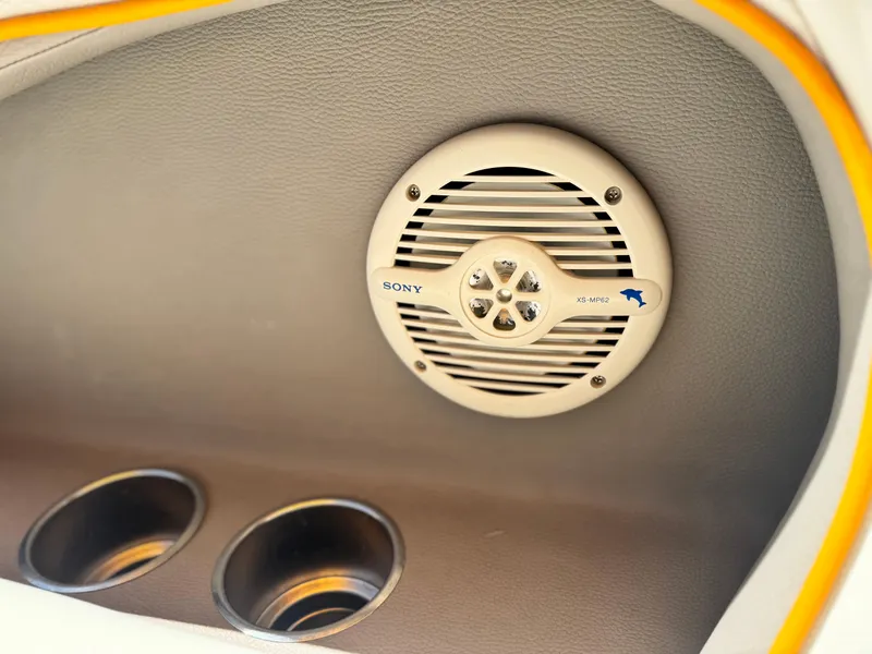 Slide: The Image of Sony speaker and cup holders in 2006 Cobalt 246 boat interior. - 20
