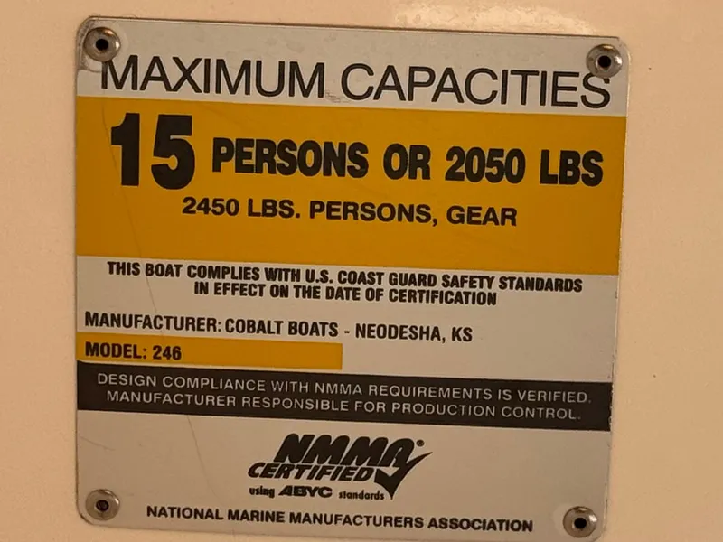 Slide: The Image of Capacity label for 2006 Cobalt 246 boat, 15 persons or 2450 lbs, NMMA certified. - 31