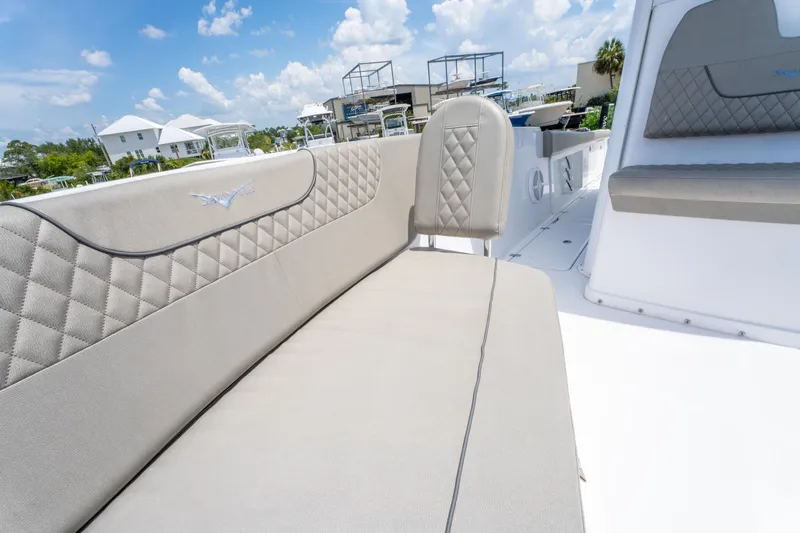 Slide: The Image of 2024 Savannah 2900 Offshore boat interior with luxurious seating and elegant design. - 15