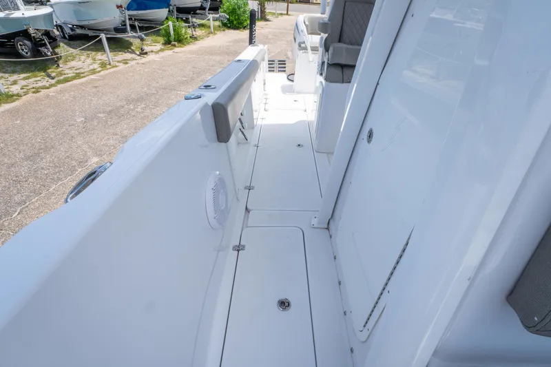 Slide: The Image of 2024 Savannah 2900 Offshore boat deck, featuring sleek design and comfortable seating. - 17