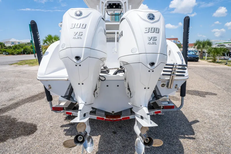 Slide: The Image of 2024 Savannah 2900 Offshore boat with dual Yamaha 300 V6 outboard engines. - 5