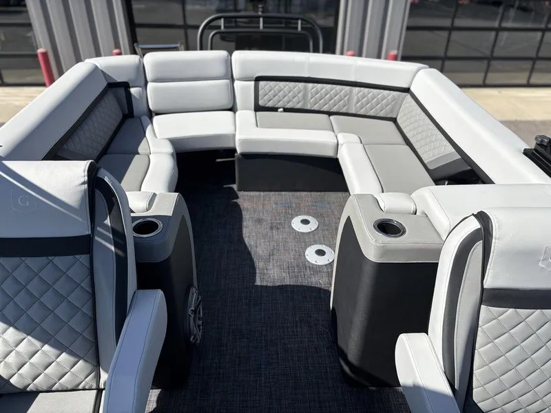 Slide: The Image of Luxurious seating on 2026 Godfrey AquaPatio 255 ULC pontoon boat, featuring quilted upholstery. - 23