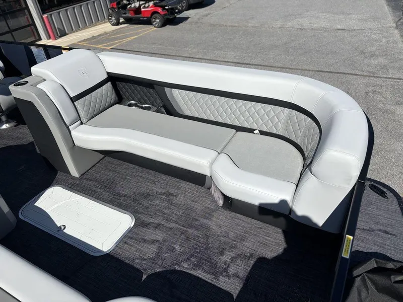 Slide: The Image of Luxurious seating on 2026 Godfrey AquaPatio 255 ULC pontoon boat, featuring quilted upholstery. - 8