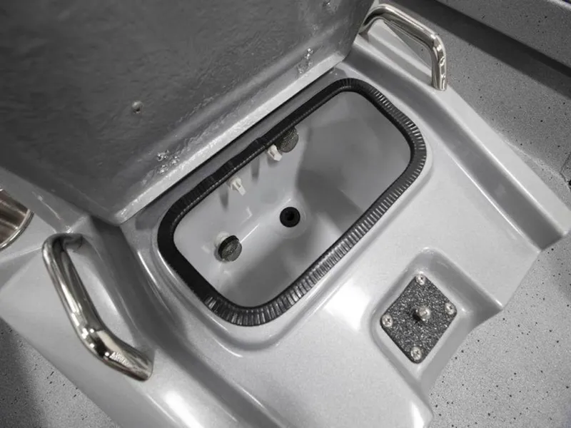 Slide: The Image of Livewell compartment in 2026 Xpress H22 Bay boat, featuring stainless steel handles. - 5