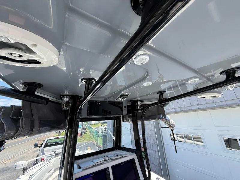 Slide: The Image of 2022 NauticStar 2602 Legacy boat interior, featuring sleek design and modern equipment. - 26