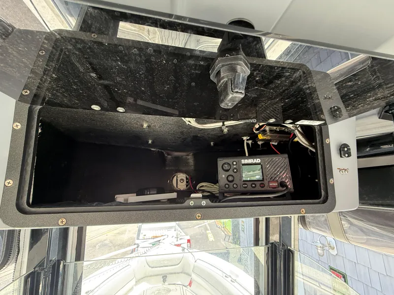 Slide: The Image of 2022 NauticStar 2602 Legacy boat console with Simrad marine electronics. - 28