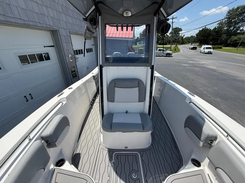 Slide: The Image of 2022 NauticStar 2602 Legacy boat interior with seating and modern design. - 32