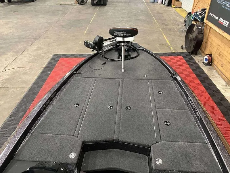 Slide: The Image of 2018 Skeeter ZX250 boat deck with trolling motor in a showroom. - 4