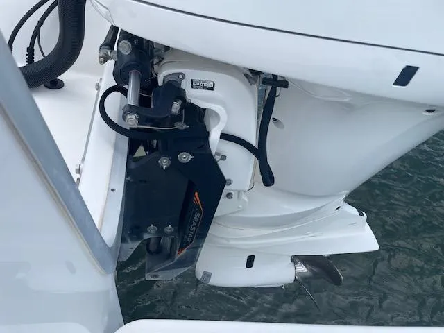 Slide: The Image of 2021 Regulator 26XO boat engine close-up, showcasing sleek design and advanced technology. - 14