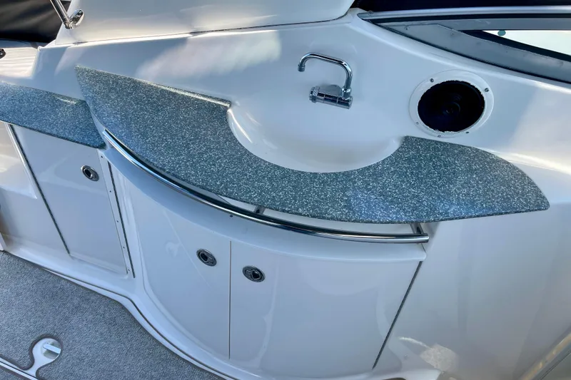 Slide: The Image of 2005 Chaparral Signature 350 boat interior with sink and countertop. - 18