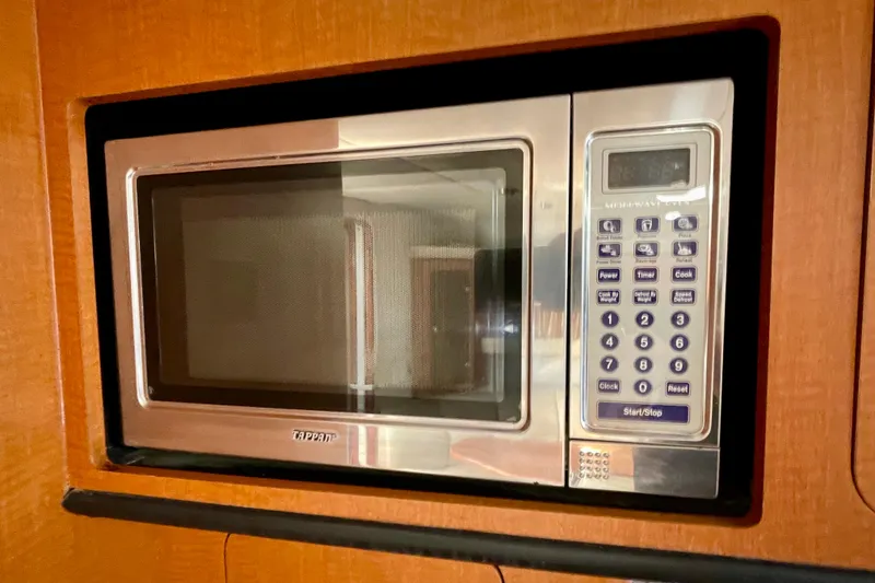 Slide: The Image of Built-in microwave in 2005 Chaparral Signature 350 yacht kitchen. - 24