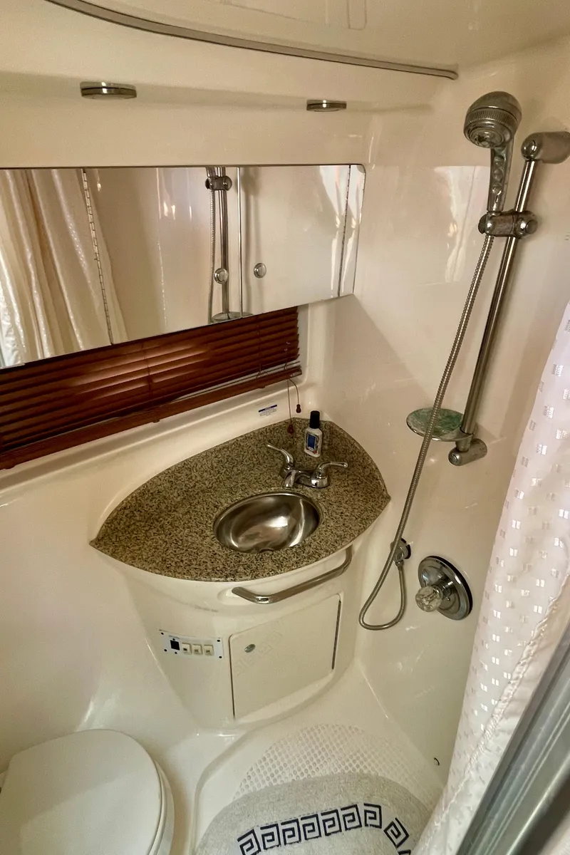 Slide: The Image of 2005 Chaparral Signature 350 bathroom with sink, shower, and toilet. - 33
