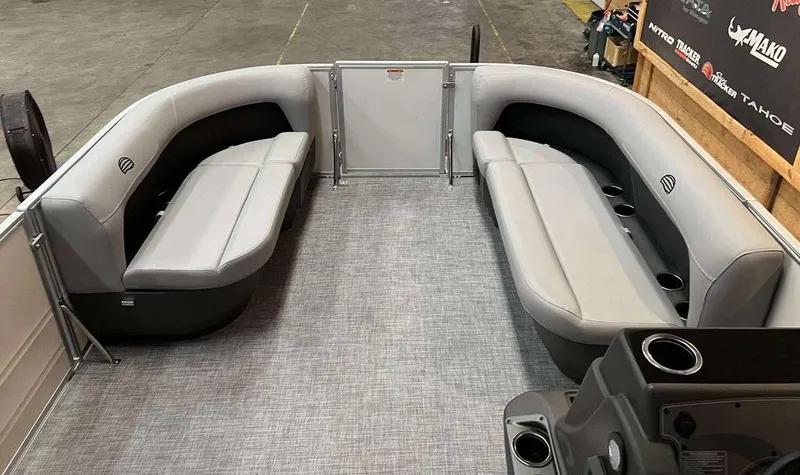 Slide: The Image of 2026 Sun Tracker PARTY BARGE® 16 DLX interior with spacious seating and cup holders. - 6