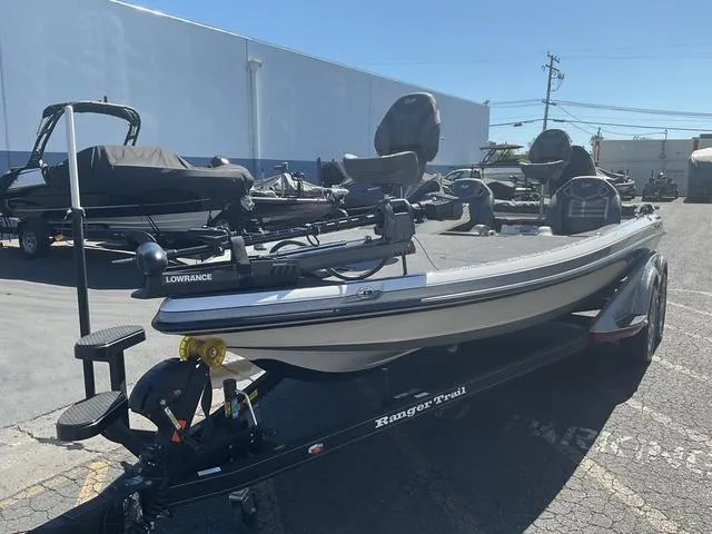 Slide: The Image of 2023 Ranger Z520R Ranger Cup Equipped boat on trailer in outdoor lot. - 11