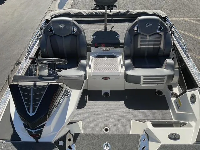 Slide: The Image of 2023 Ranger Z520R Ranger Cup boat interior with dual seats and steering console. - 5