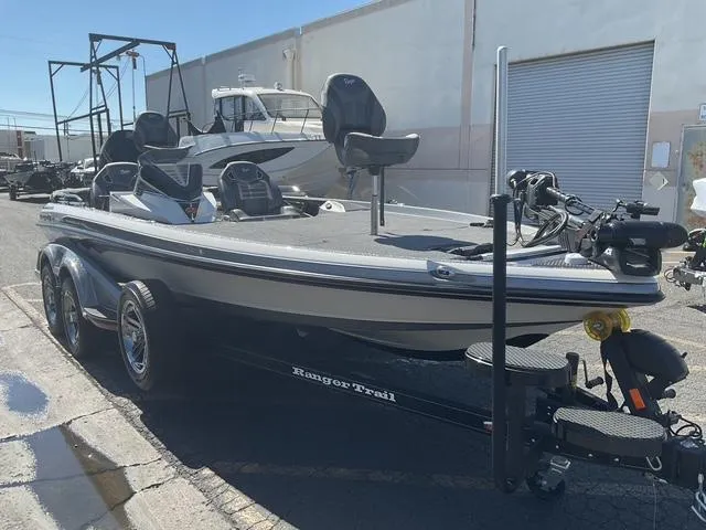 Slide: The Image of 2023 Ranger Z520R Ranger Cup Equipped boat on trailer, parked outdoors. - 9