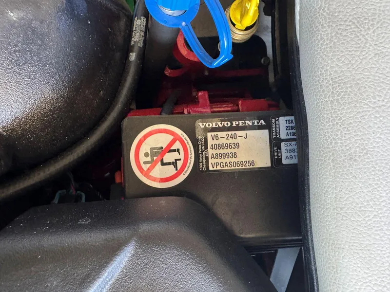 Slide: The Image of Engine compartment of 2018 Regal 1900 ESX Bowrider with Volvo Penta V6-240-J label. - 12