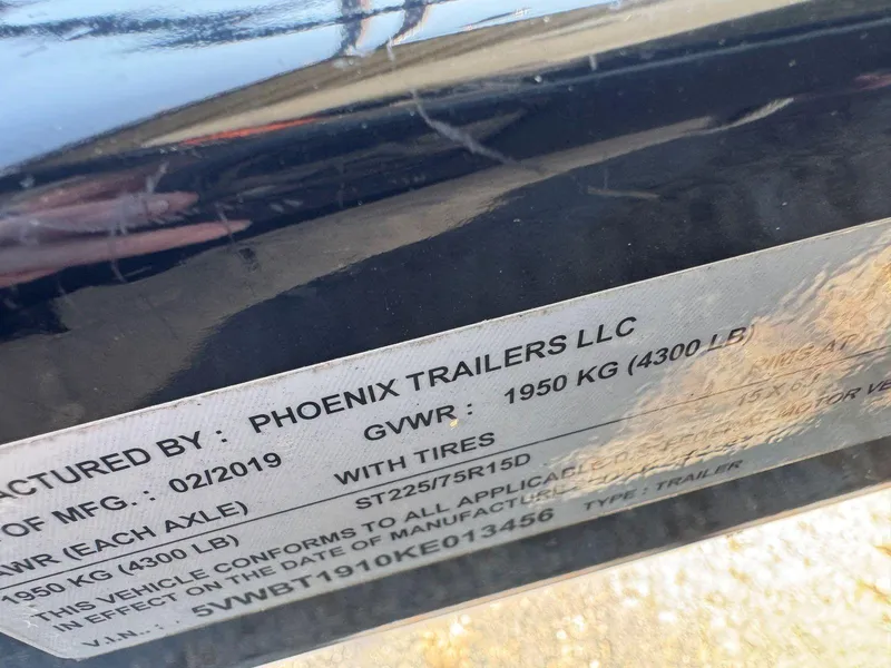 Slide: The Image of Label on a Regal 1900 ESX Bowrider trailer by Phoenix Trailers LLC, 2018 model. - 26