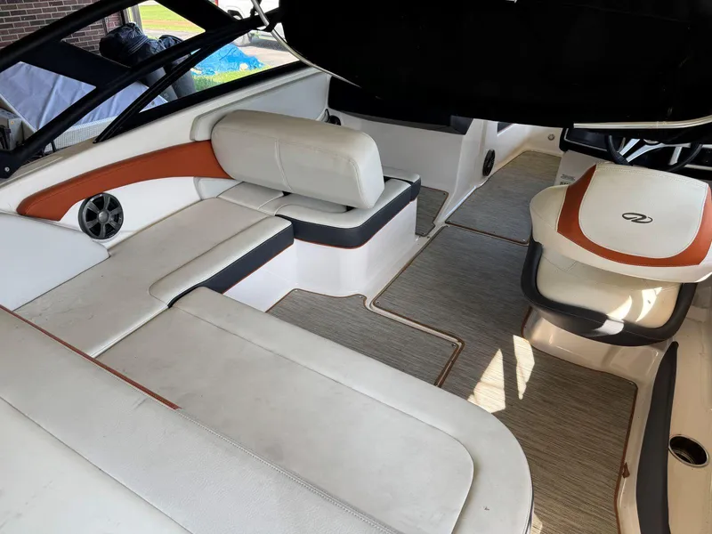 Slide: The Image of 2018 Regal 1900 ESX Bowrider interior with white and orange seating. - 5