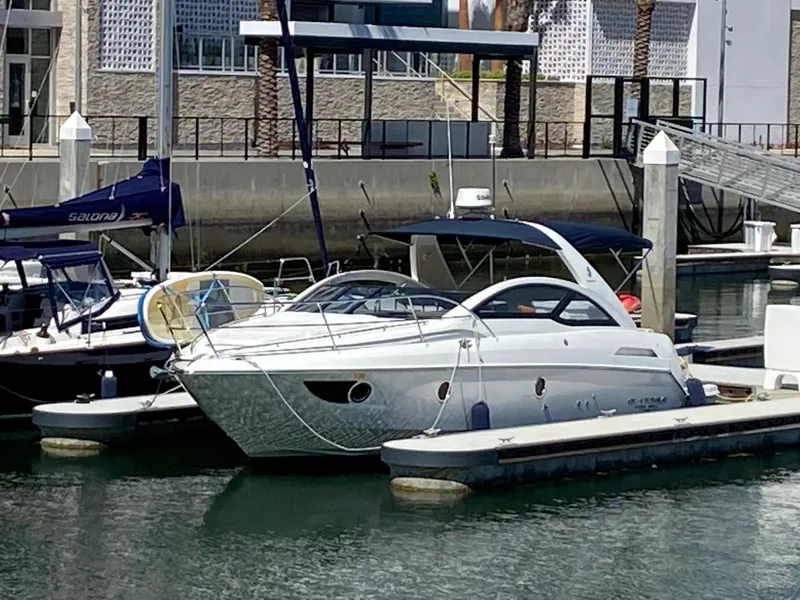 Slide: The Image of 2016 Beneteau GT35 yacht docked at a marina. - 1