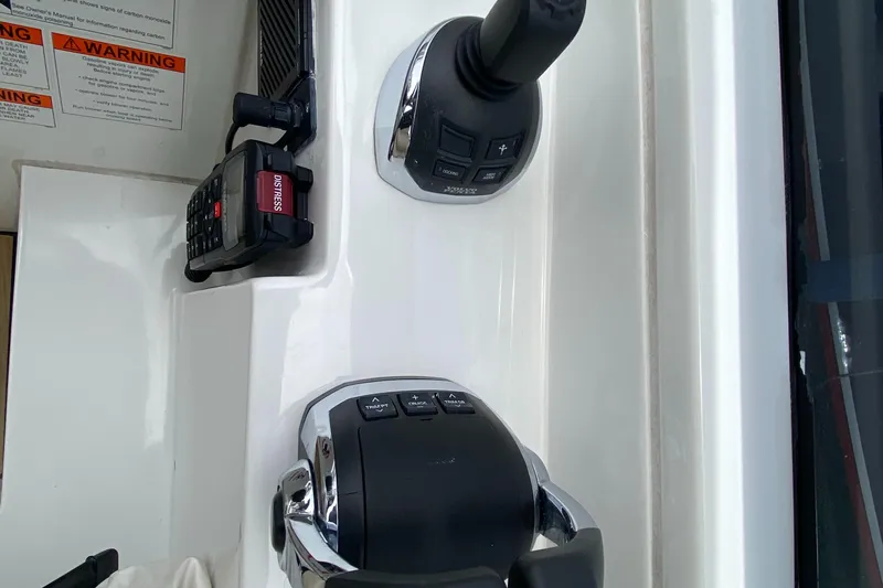 Slide: The Image of Beneteau GT35 2016 boat controls and joystick in cockpit. - 15