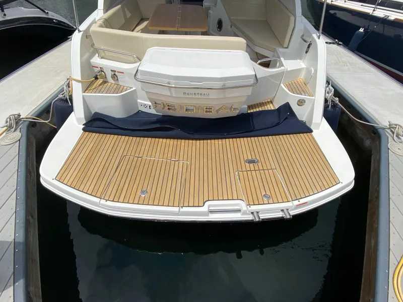 Slide: The Image of 2016 Beneteau GT35 yacht stern view with teak swim platform. - 41