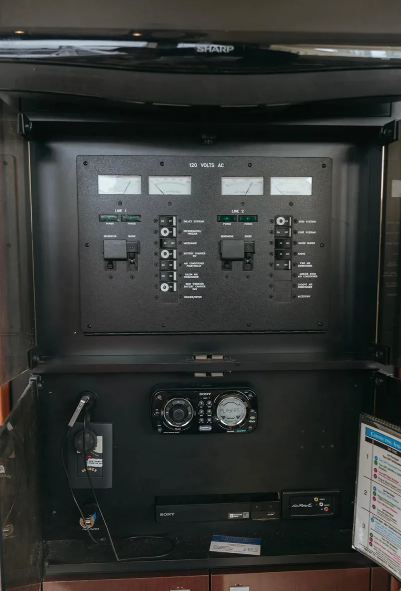 Slide: The Image of Electrical control panel on a 2010 Sea Ray 390 Sedan Bridge yacht. - 16