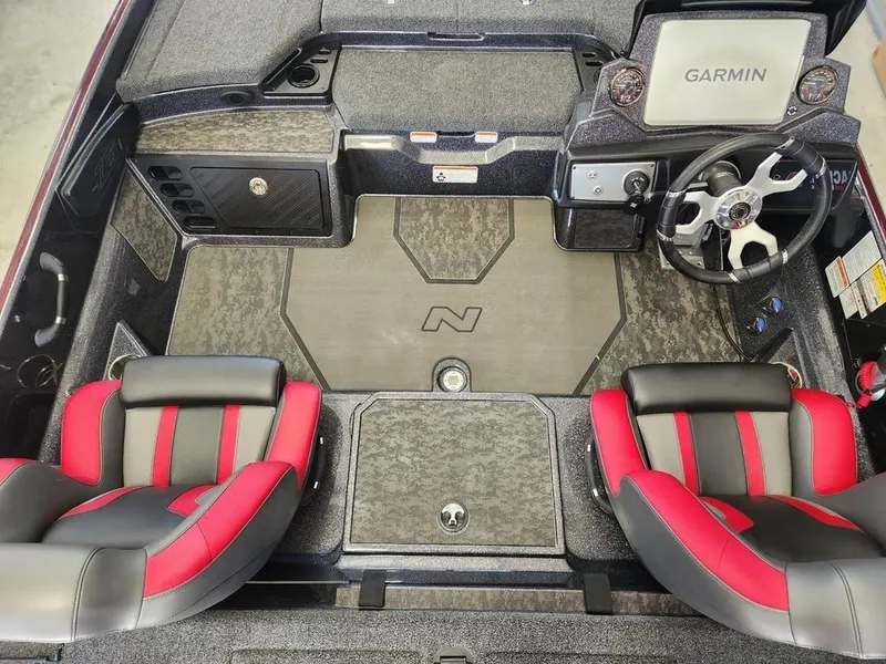 Slide: The Image of 2026 Nitro Z21 XL Pro boat interior with Garmin display and red-black seats. - 4