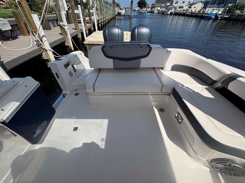 Slide: The Image of 2020 Chaparral 300 OSX boat interior with seating and water view. - 16