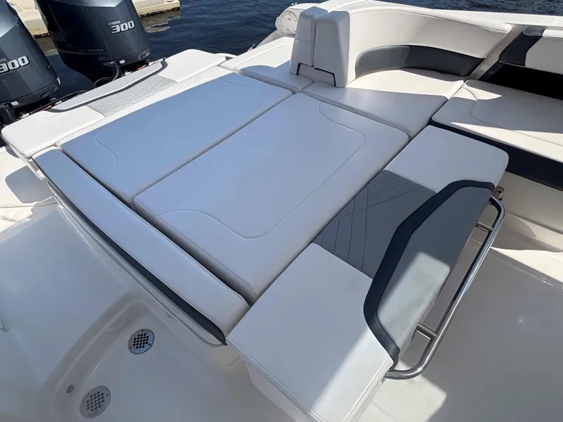 Slide: The Image of 2020 Chaparral 300 OSX boat with spacious sunbed and dual Yamaha 300 engines. - 26