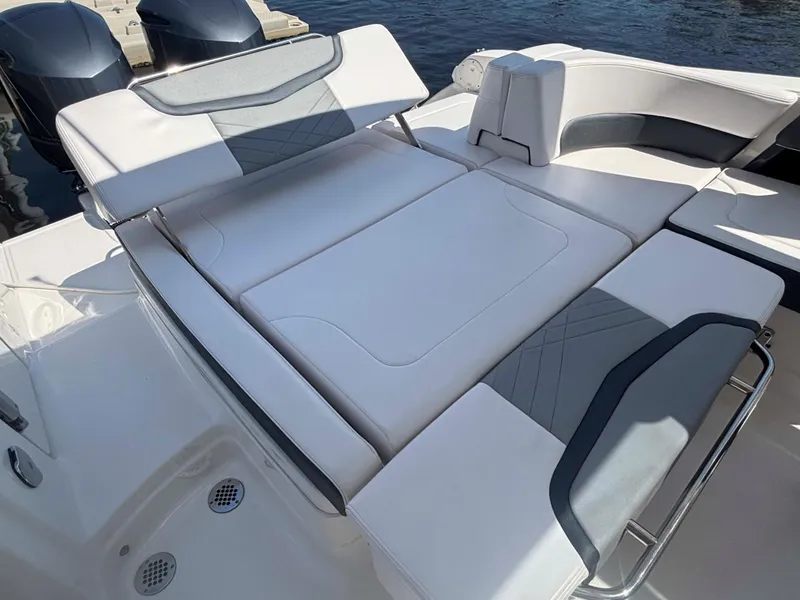 Slide: The Image of 2020 Chaparral 300 OSX boat with spacious, luxurious seating on deck. - 28