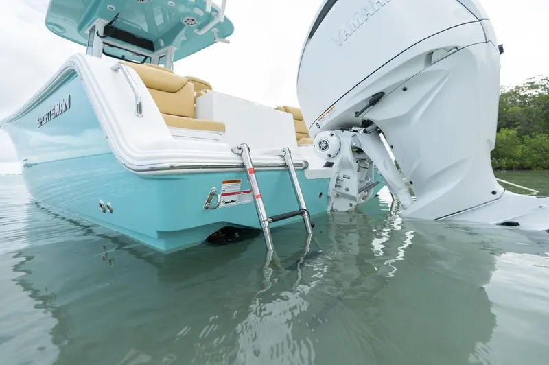 Slide: The Image of 2025 Sportsman Heritage 231 boat with Yamaha engine in shallow water. - 6