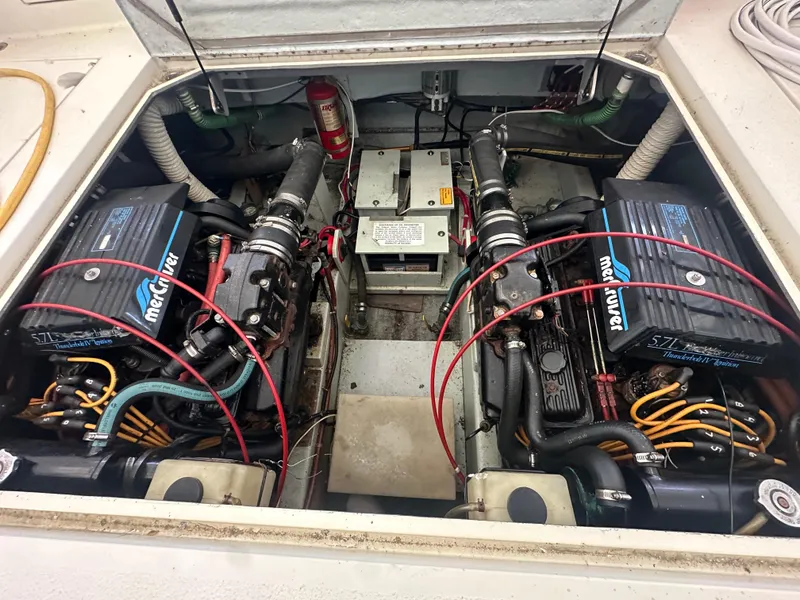 Slide: The Image of Engine compartment of a 1989 Tollycraft 30 Sedan with dual MerCruiser engines. - 25