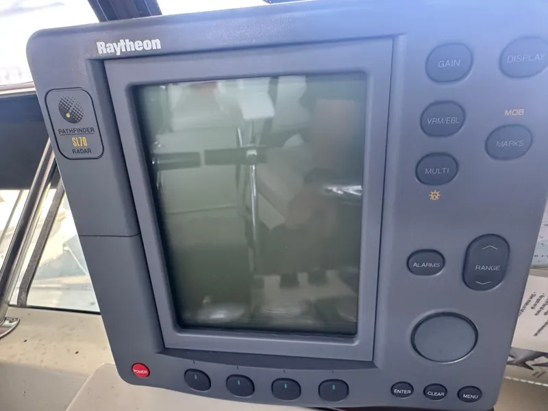 Slide: The Image of Raytheon Pathfinder SL70 radar display on 1989 Tollycraft 30 Sedan boat. - 27