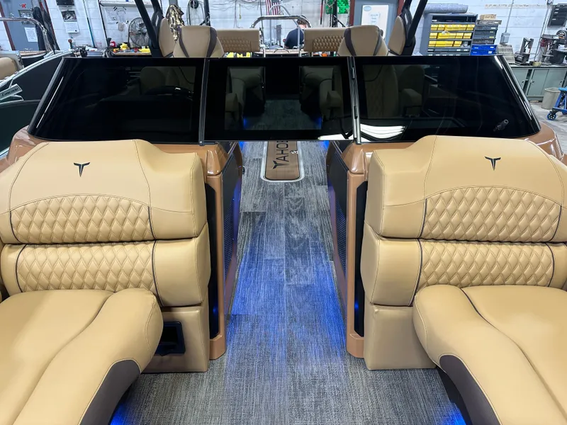 Slide: The Image of Luxurious interior of 2025 Tahoe Grand Tahoe 2585 Tritoon with plush seating and modern design. - 11