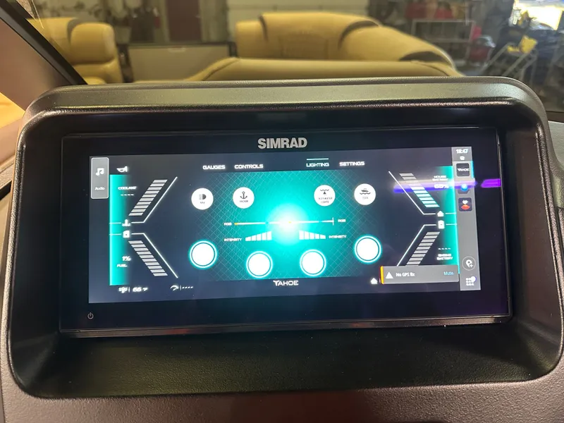 Slide: The Image of Simrad display on 2025 Tahoe Grand Tahoe 2585 Tritoon, showing gauges and controls. - 17