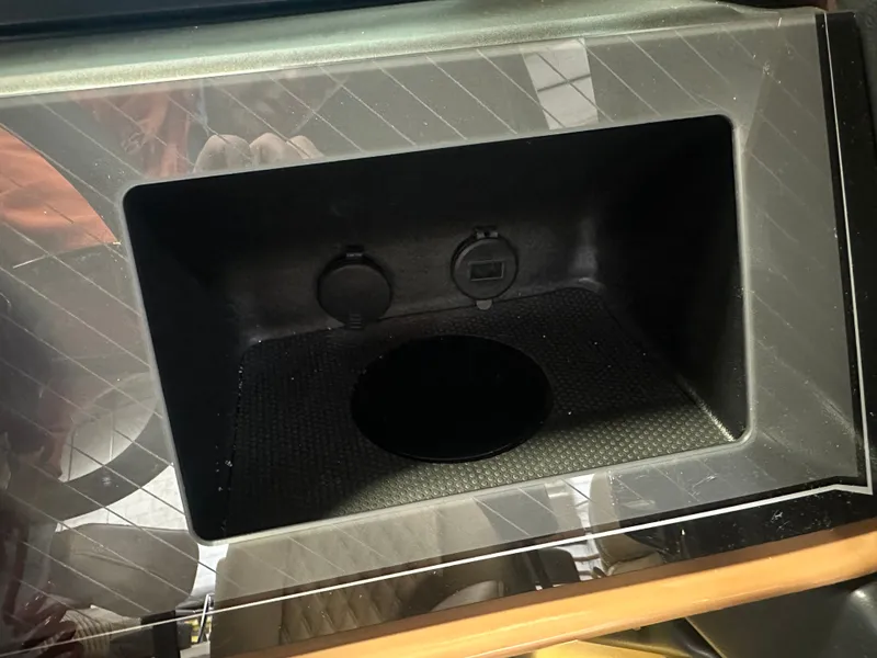 Slide: The Image of Storage compartment in 2025 Tahoe Grand Tahoe 2585 Quad Lounge Tritoon. - 21