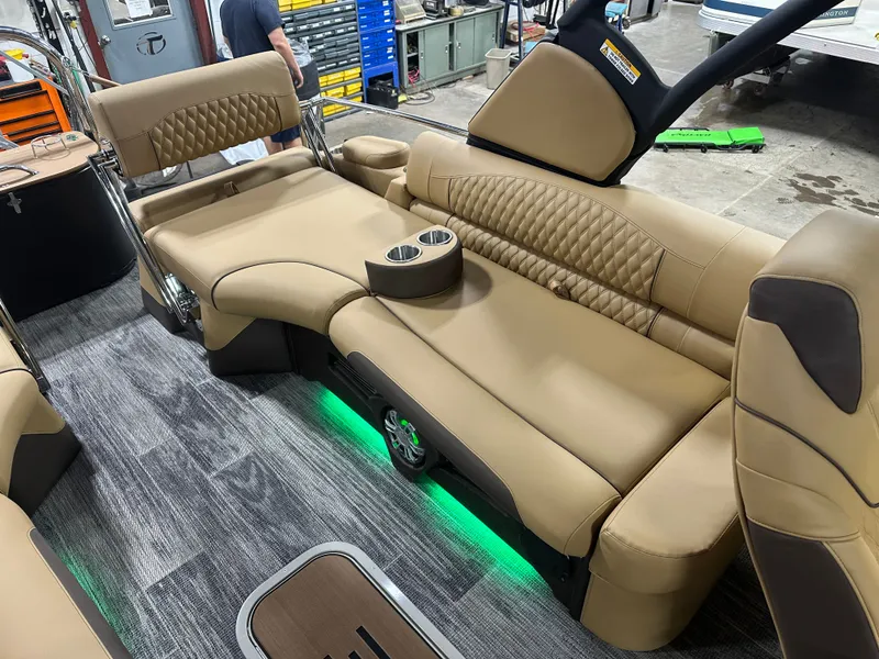 Slide: The Image of Luxurious interior of 2025 Tahoe Grand Tahoe 2585 Tritoon with plush seating and ambient lighting. - 25