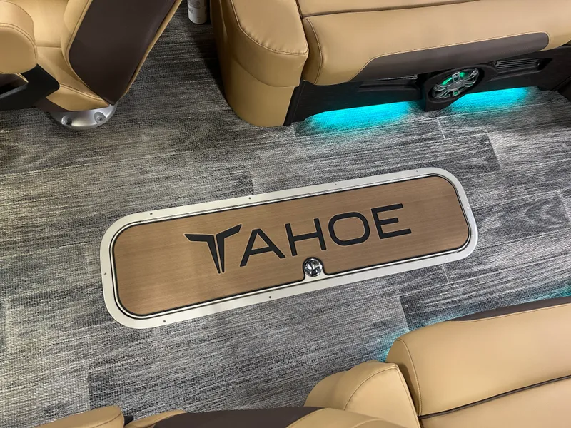 Slide: The Image of Luxurious interior of 2025 Tahoe Grand Tahoe 2585 Tritoon with stylish flooring and seating. - 26