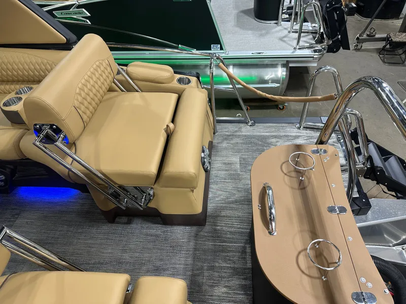 Slide: The Image of Luxurious seating and deck of 2025 Tahoe Grand Tahoe 2585 Tritoon boat. - 28