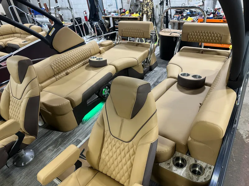 Slide: The Image of Luxurious interior of 2025 Tahoe Grand Tahoe 2585 Tritoon with plush seating and modern amenities. - 4