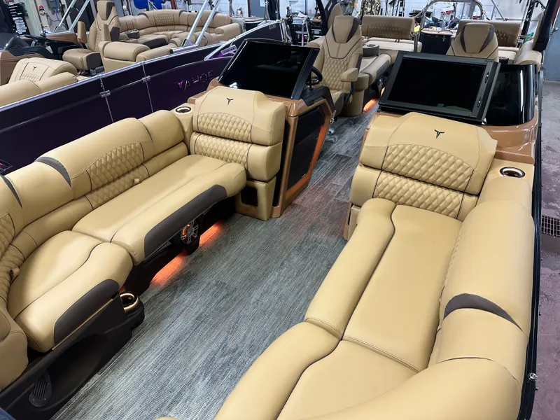 Slide: The Image of Luxurious interior of 2025 Tahoe Grand Tahoe 2585 Tritoon with plush seating and modern design. - 44