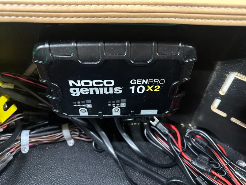 Slide: The Image of NOCO Genius GENPRO 10X2 charger in 2025 Tahoe Grand Tritoon boat. - 47