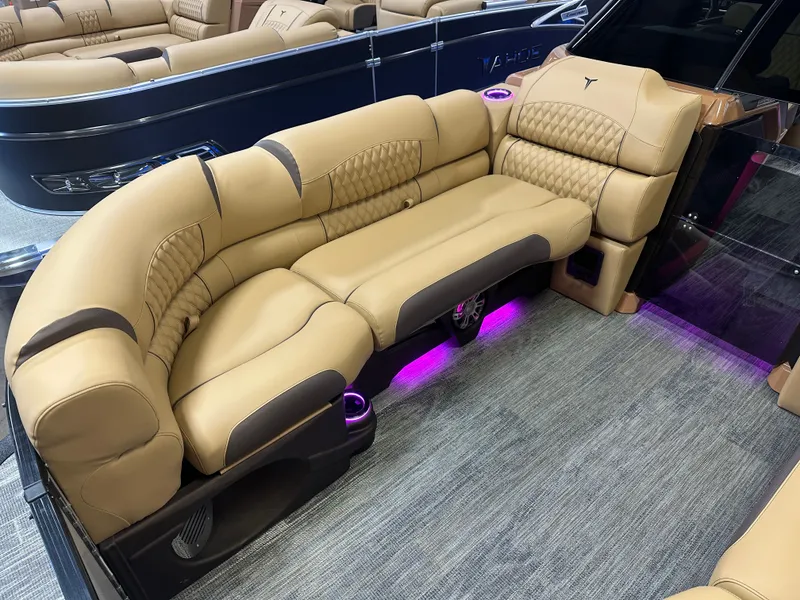 Slide: The Image of Luxurious seating in 2025 Tahoe Grand Tahoe 2585 Tritoon with ambient lighting and premium upholstery. - 8