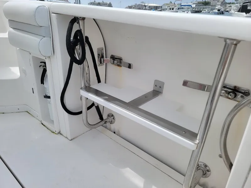 Slide: The Image of Interior view of a 2010 Intrepid 39 Kevlar Hull yacht, featuring a storage compartment. - 16