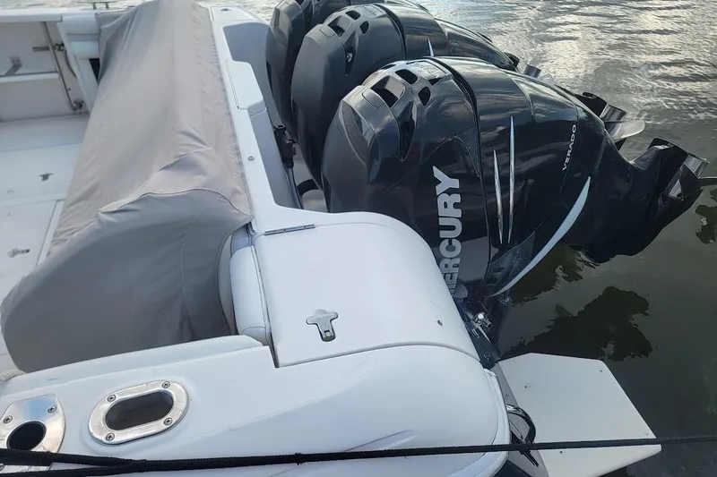 Slide: The Image of 2010 Intrepid 39 Kevlar Hull yacht with Mercury outboard engines on water. - 38