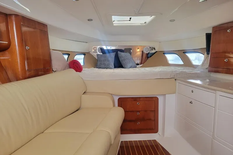 Slide: The Image of Luxurious interior of 2010 Intrepid 39 Kevlar Hull yacht with cozy bed and seating. - 7