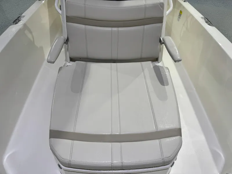 Slide: The Image of 2024 Boston Whaler 250 Dauntless boat interior with modern helm and seating. - 9