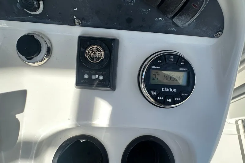Slide: The Image of Control panel of a 2005 Boston Whaler 320 Outrage with Clarion audio system. - 41